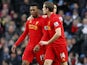 Liverpool striker Daniel Sturridge is congratulated by teammates after scoring against Manchester City on February 3, 2013