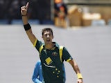 Australia's Mitchell Starc celebrates taking the wick of West Indies player Jason Holder during their team's one day international on February 1, 2013