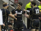 Scotland's Sean Maitland celebrates with teammates after scoring a try against England on February 2, 2013