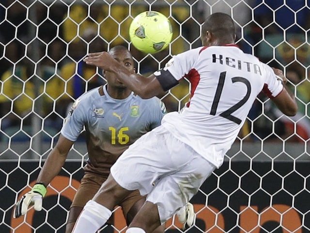 Mali captain Seydou Keita scores a goal against South Africa on February 2, 2013