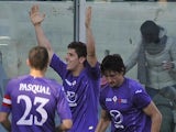 Fiorentina's Stefan Jovetic celebrates with team mates after scoring his team's second against Parma on February 3, 2013