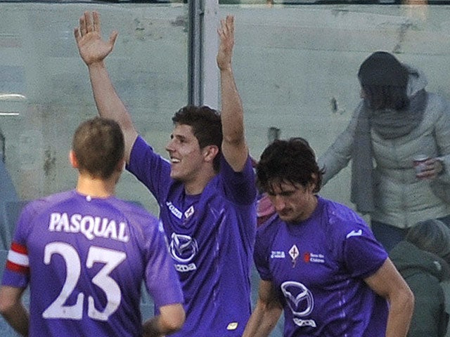 Fiorentina's Stefan Jovetic celebrates with team mates after scoring his team's second against Parma on February 3, 2013