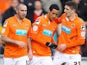 Blackpool players congratulate Tom Ince following his goal against Barnsley on February 2, 2013