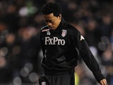 New Fulham signing Urby Emanuelson warms up before the game against Man Utd on February 2, 2013