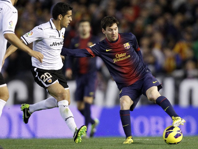 Barcelona's Lionel Messi on the ball during his side's match with Valencia on February 3, 2013