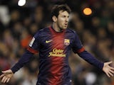 Barcelona's Lionel Messi celebrates after scoring in his side's match with Valencia on February 3, 2013