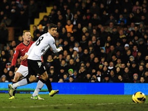 United forward Wayne Rooney opens the scoring at Fulham on February 2, 2013
