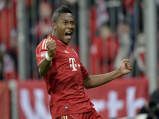 Bayern's David Alaba celebrates after scoring for his side in their match against Schalke on February 9, 2013