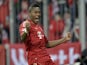 Bayern's David Alaba celebrates after scoring for his side in their match against Schalke on February 9, 2013