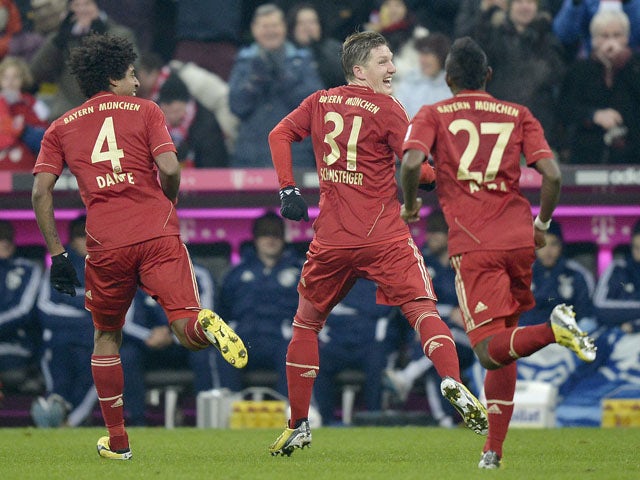 Bayern Munich player Bastian Schweinsteiger celebrates after scoring in his side's match against Schalke on February 9, 2013