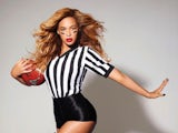 Beyonce posing with a ball in a Super Bowl promo shot