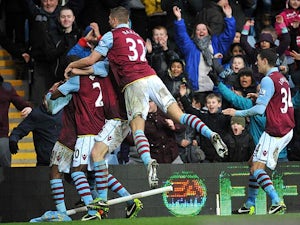 Charles N'Zogbia is mobbed by team mates after scoring his team's second against West Ham on February 10, 2013