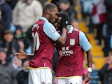 Christian Benteke is congratulated by team mate Simon Dawkins after scoring the opener against West Ham on February 10, 2013