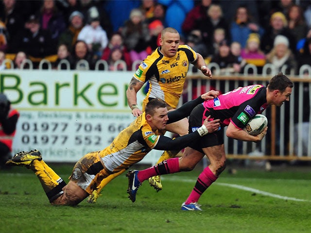 Leeds Rhinos' Danny McGuire scores a try against Castleford Tigers on February 10, 2013