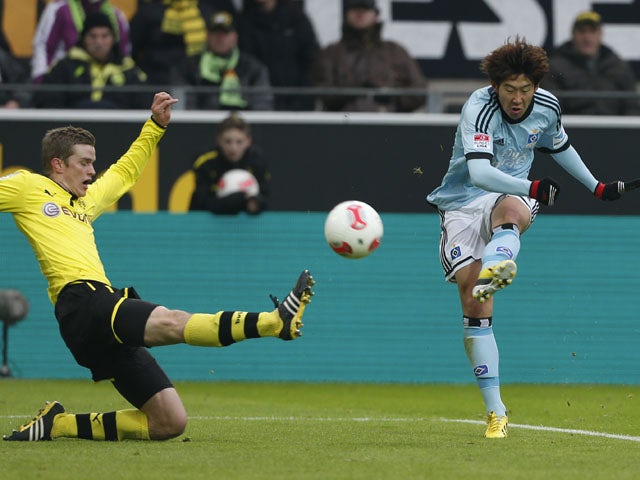 Hamburg's Son Heung-min scores in his side's match against Dortmund on February 9, 2013