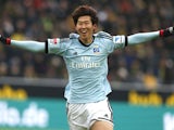 Hamburg's Son Heung-min celebrates after scoring in his side's match against Dortmund on February 9, 2013