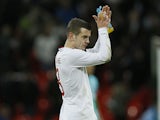 England player Jack Wilshere applauds the fans after his side's match with Brazil on February 6, 2013