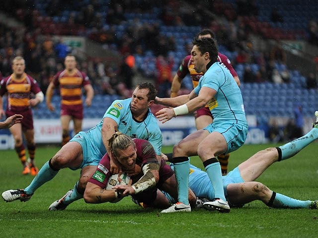 Huddersfield Giants' Eorl Crabtree scores a try against London Broncos on February 10, 2013