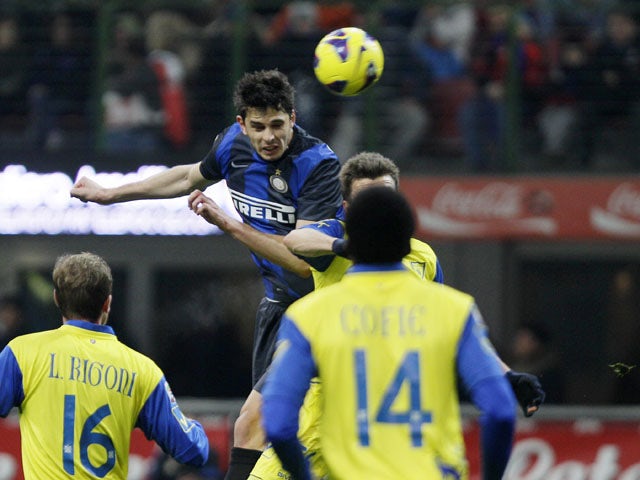 Inter Milan defender Andrea Ranocchia scores his side's second goal against Chievo on February 10, 2013