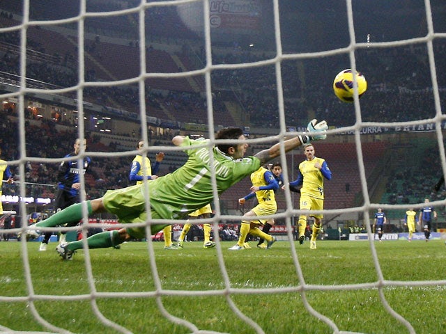 Inter Milan forward Diego Milito scores for his side against Chievo on February 10, 2013