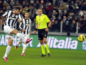 Mirko Vucinic scores for Juventus during their match with Fiorentina on February 9, 2013