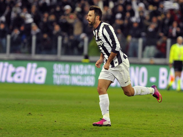 Mirko Vucinic celebrates after scoring for Juventus during their match with Fiorentina on February 9, 2013