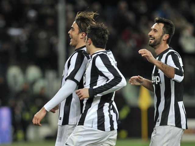 Alessandro Matri celebrates with teammates after scoring Juventus' second goal in their match against Fiorentina on February 9, 2013