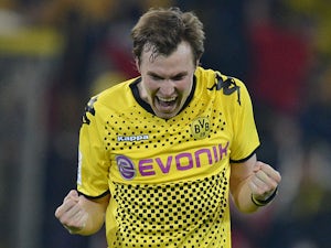 Dortmund player Kevin Grosskreutz celebrates after his side's match with Bayern Munich on April 11, 2012