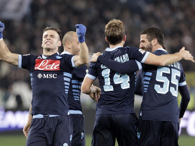 Napoli players celebrate scoring a late equalising goal in their match with Lazio on February 9, 2013