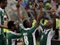 Nigeria players celebrate after a goal in their African Cup of Nations match with Mali on February 6, 2013