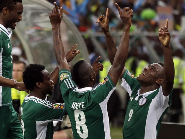 Nigeria players celebrate after a goal in their African Cup of Nations match with Mali on February 6, 2013