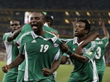 Nigeria's Sunday Mba celebrates alongside teammates after scoring against Burkina Faso in the African Cup of Nations final on February 10, 2013