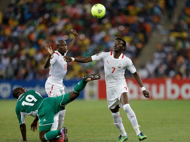 Burkina Faso player Florent Rouamba challenges for the ball during the final of the African Cup of Nations on February 10, 2013