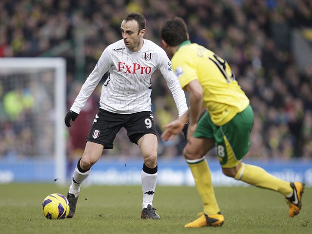 Fulham's Dimitar Berbatov on the ball during his side's match with Norwich on  February 9, 2013