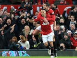 Ryan Giggs celebrates his opening goal with Robin Van Persie against Everton on February 10, 2013