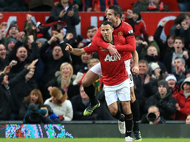 Ryan Giggs celebrates his opening goal with Robin Van Persie against Everton on February 10, 2013