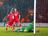 Southampton player Steven Davis celebrates scoring his team's second goal against Manchester City on February 9, 2013