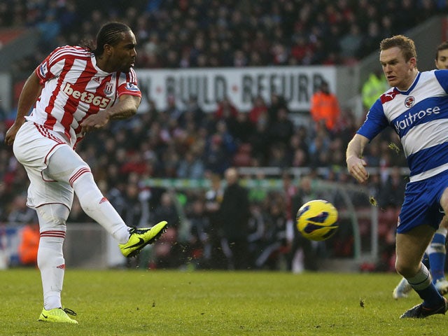 Stoke City striker Cameron Jerome scores his side's second goal against Reading on February 9, 2013