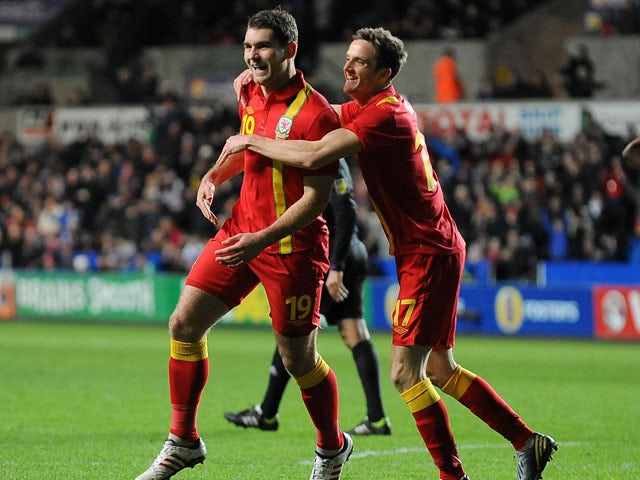 Wales player Samuel Vokes celebrates after scoring his side's second goal against Austria on February 6, 2013