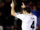 Valencia's Adil Rami celebrates his late goal against Paris Saint-Germain on February 12, 2013
