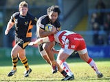 London Wasps' Billy Vunipola is tackled by Gloucester's Nick Wood on February 17, 2013