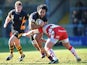 London Wasps' Billy Vunipola is tackled by Gloucester's Nick Wood on February 17, 2013