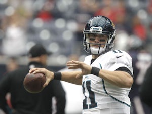 Jacksonville Jaguars quaterback Blaine Gabbert throws the ball before his team's match with the Houston Texans on November 18, 2012
