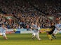 Wigan's Callum McManaman scores the opener during the FA Cup 5th round against Huddersfield on February 17, 2013