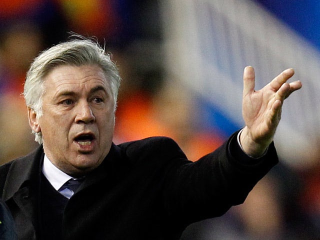 Paris Saint-Germain's boss Carlo Ancelotti on the touchline during the Champions League match against Valencia on February 12, 2013