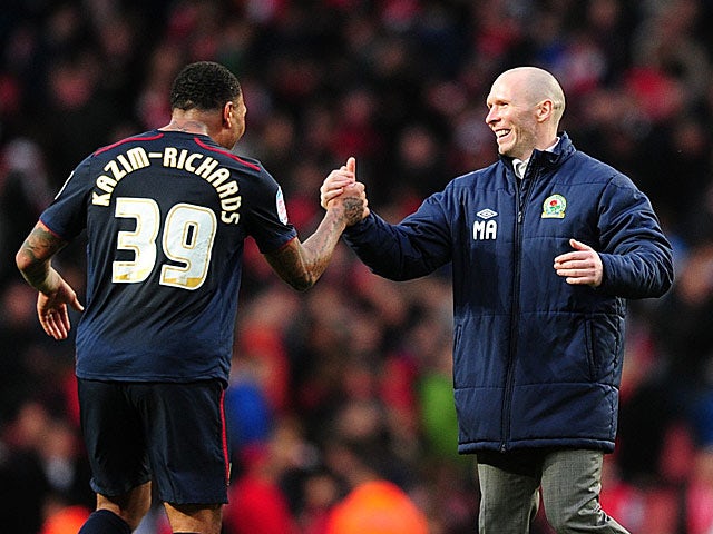 Blackburn's Colin Kazim-Richards celebrates with manager Michael Appleton after scoring the winner against Arsenal in the FA Cup 5th round on February 16, 2013