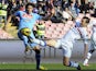 Napoli's Edinson Cavani and Sampdoria's Daniele Gastaldello battle for the ball on February 17, 2013