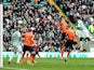Celtic's Efe Ambrose heads in the equaliser against Dundee United on February 16, 2013