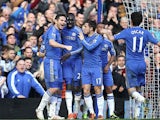 Chelsea's Frank Lampard is congratulated by team mates after scoring his team's third in the FA Cup 4th round replay against Brentford on February 17, 2013