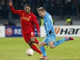 Liverpool's Glen Johnson fights for the ball with Zenit's Tomas Hubochan on February 14, 2013